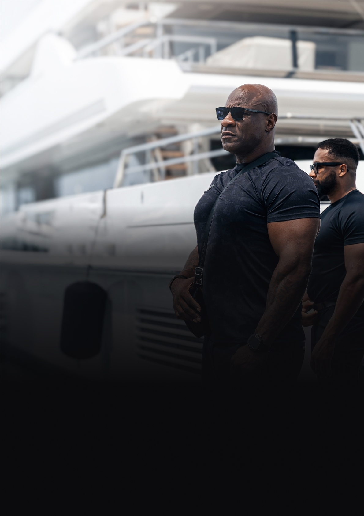 LEON close protection officers in front of a yacht